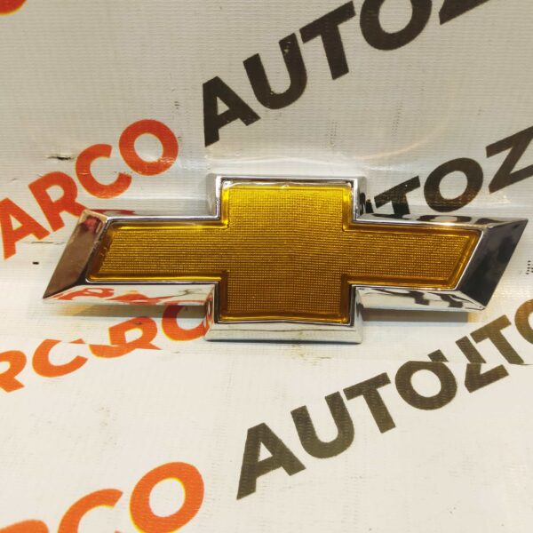 FRONT GRILL LOGO TAVERA T3 IMP